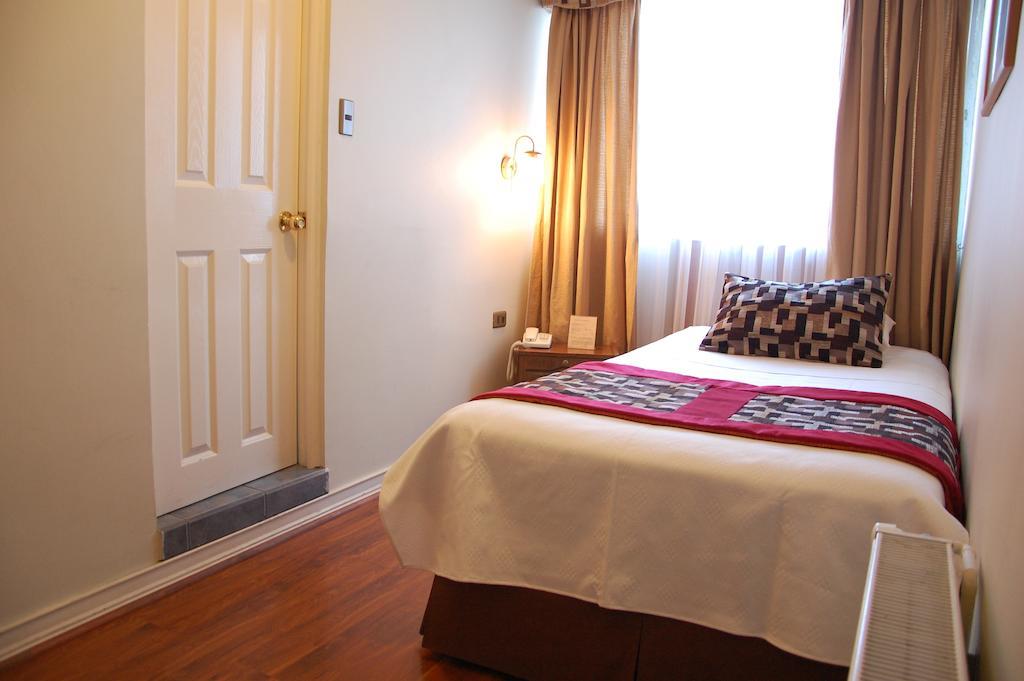 Hotel Plaza Concepcion Ruang foto
